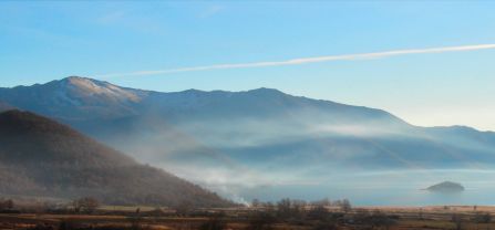Morning mist over Prespa National Park (Florina Regional Unit, Greece), illustrating the park&rsquo;s rich mosaic of wetland and mountain habitats that sustain high biodiversity and ecological balance (February 2016; Photo credit: Maria Psaralexi).