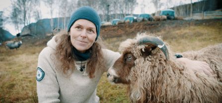 Shepherdess with a sheep. 