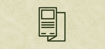 An icon showing a brochure representing communication materials. 